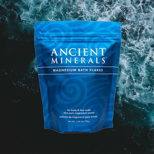 Ancient Minerals Magnesium Bath Flakes on ocean background