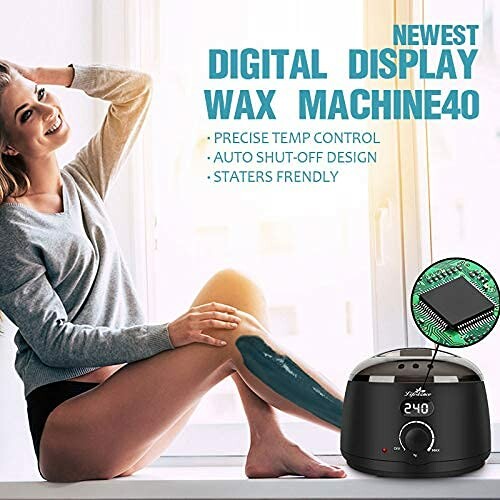 Woman using digital display wax machine for leg waxing.