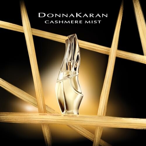 Donna Karan Cashmere Mist perfume bottle with golden accents