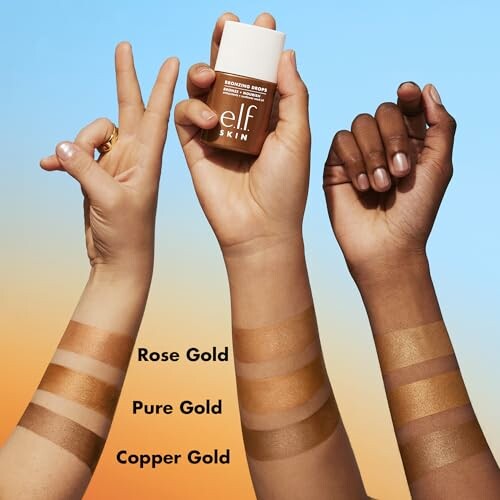 Three hands with different skin tones showing elf skin bronzer swatches in rose gold, pure gold, and copper gold.