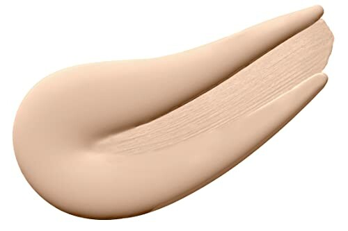 Beige foundation makeup swatch on a white background