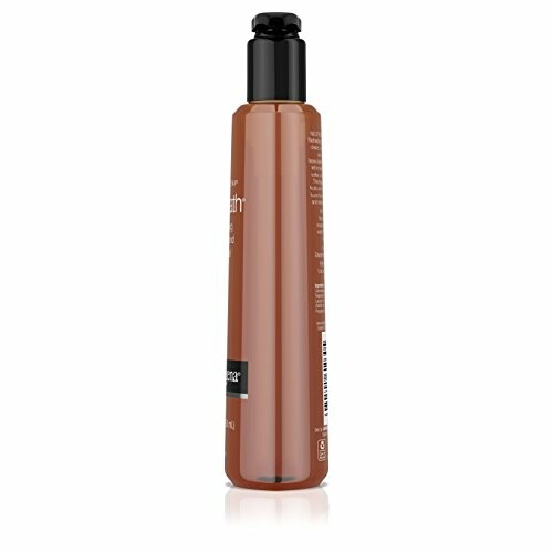 Tall brown hair care product bottle with black cap