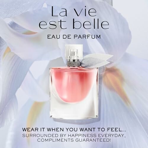 La Vie Est Belle eau de parfum bottle with floral background.