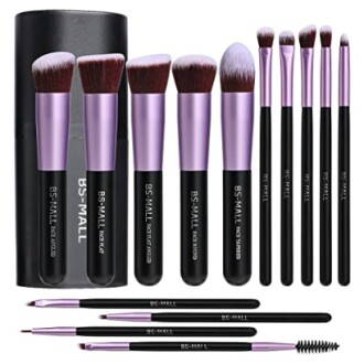 Set of purple and black makeup brushes with case