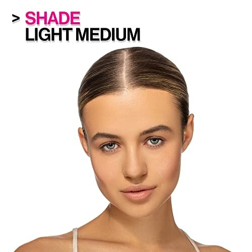 Woman with light medium makeup shade