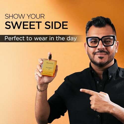 Man holding a bottle of perfume labeled 'Honey' with text 'Show your sweet side, perfect to wear in the day'.