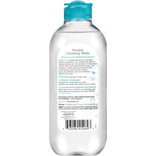 Back view of a micellar cleansing water bottle with text and instructions.