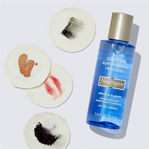 Neutrogena oil-free eye makeup remover with used cotton pads.