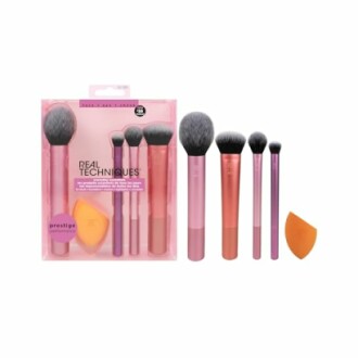 Real Techniques makeup brush set with six brushes and a sponge.