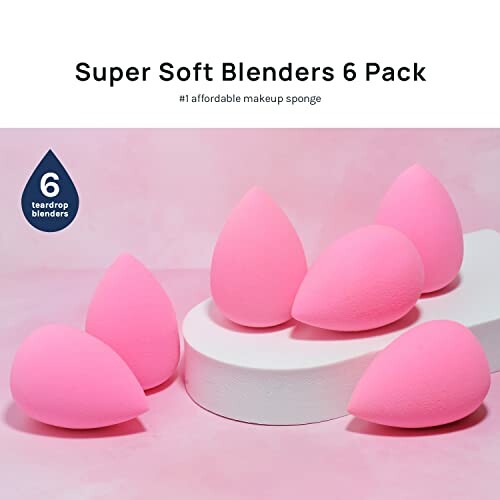 Six pink teardrop-shaped makeup blenders on display