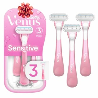 Venus Sensitive razors with three blades, pink handles, and packaging.