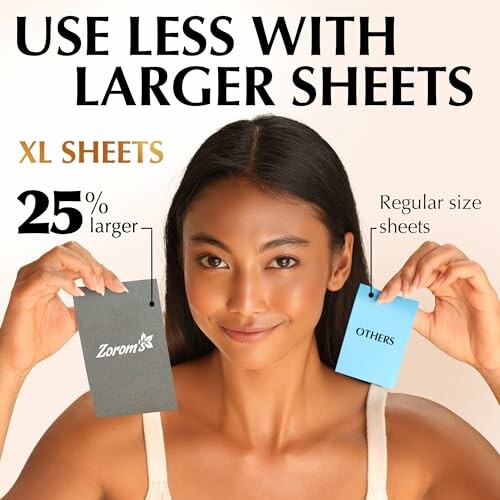 Woman comparing larger and regular paper sheets with text about size difference.